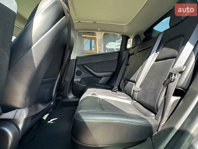 Серый Тесла Model Y, объемом двигателя 0 л и пробегом 68 тыс. км за 25500 $, фото 15 на Automoto.ua