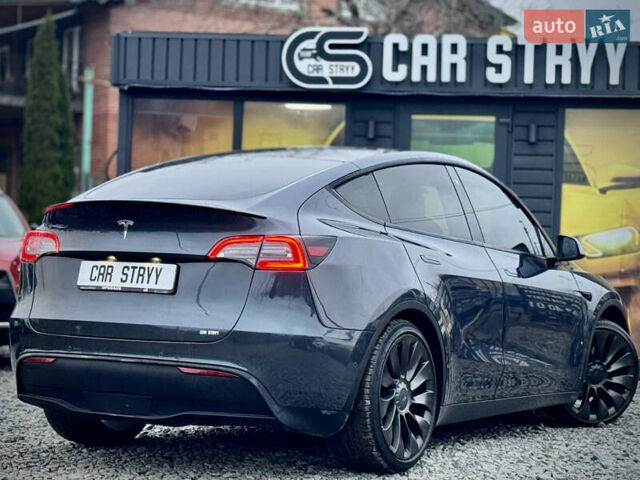 Серый Тесла Model Y, объемом двигателя 0 л и пробегом 107 тыс. км за 23999 $, фото 3 на Automoto.ua