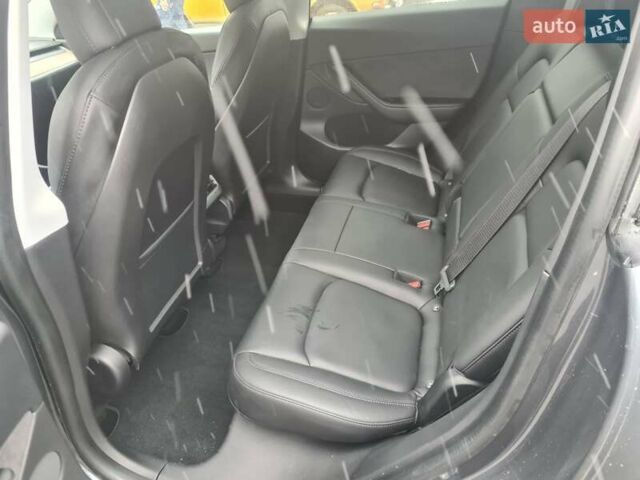 Серый Тесла Model Y, объемом двигателя 0 л и пробегом 85 тыс. км за 28500 $, фото 6 на Automoto.ua