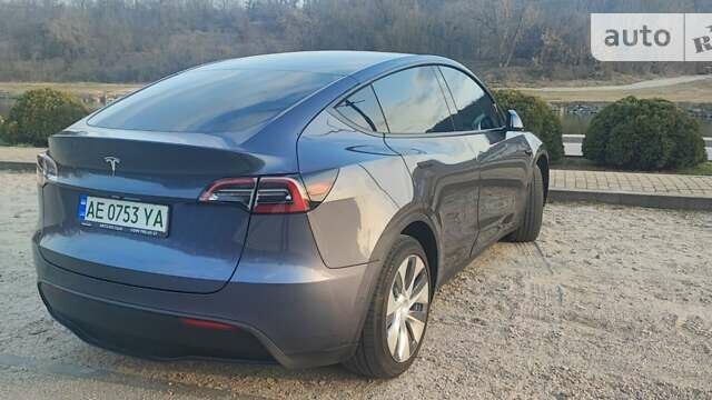Серый Тесла Model Y, объемом двигателя 0 л и пробегом 61 тыс. км за 22900 $, фото 5 на Automoto.ua