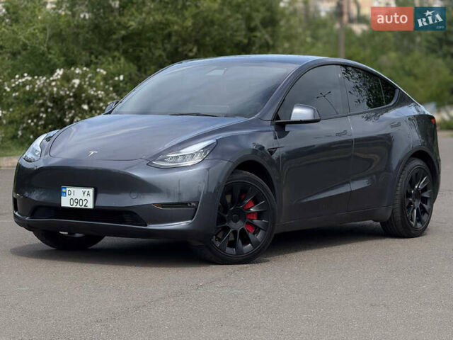 Серый Тесла Model Y, объемом двигателя 0 л и пробегом 91 тыс. км за 26500 $, фото 1 на Automoto.ua