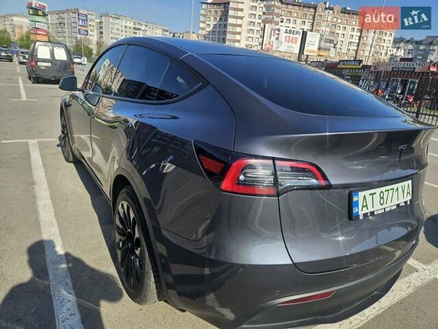 Серый Тесла Model Y, объемом двигателя 0 л и пробегом 87 тыс. км за 23777 $, фото 1 на Automoto.ua