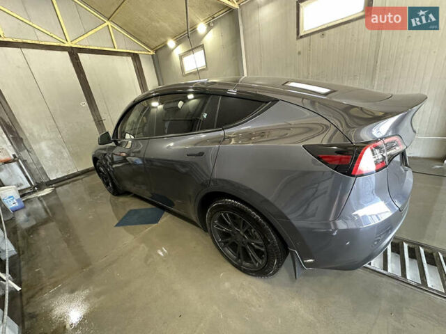 Серый Тесла Model Y, объемом двигателя 0 л и пробегом 55 тыс. км за 29000 $, фото 10 на Automoto.ua