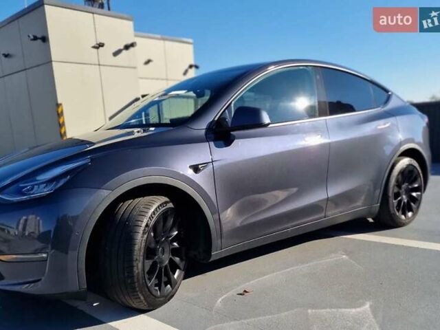 Сірий Тесла Model Y, об'ємом двигуна 0 л та пробігом 80 тис. км за 27700 $, фото 4 на Automoto.ua