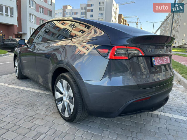 Сірий Тесла Model Y, об'ємом двигуна 0 л та пробігом 52 тис. км за 23499 $, фото 11 на Automoto.ua