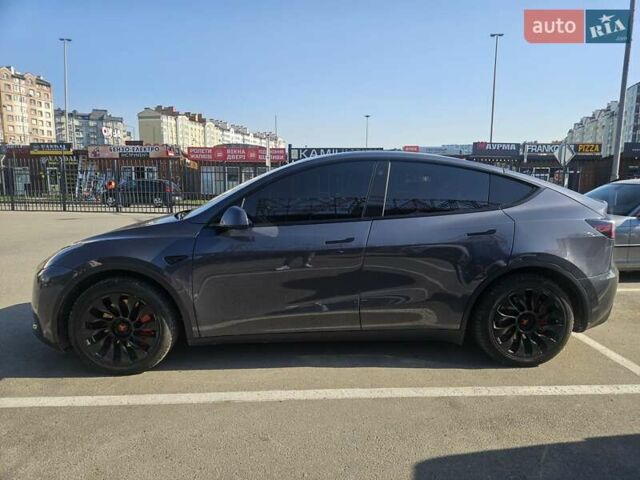 Серый Тесла Model Y, объемом двигателя 0 л и пробегом 87 тыс. км за 23777 $, фото 9 на Automoto.ua