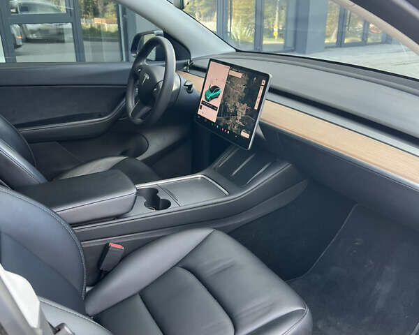 Серый Тесла Model Y, объемом двигателя 0 л и пробегом 57 тыс. км за 23300 $, фото 6 на Automoto.ua