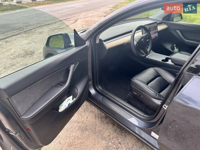Серый Тесла Model Y, объемом двигателя 0 л и пробегом 61 тыс. км за 29000 $, фото 4 на Automoto.ua