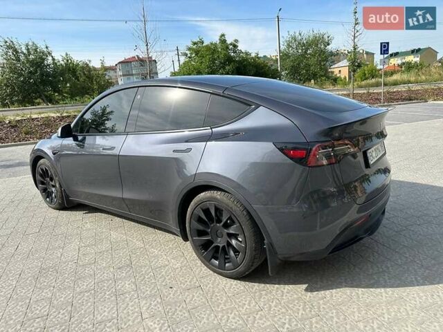 Серый Тесла Model Y, объемом двигателя 0 л и пробегом 74 тыс. км за 27800 $, фото 3 на Automoto.ua