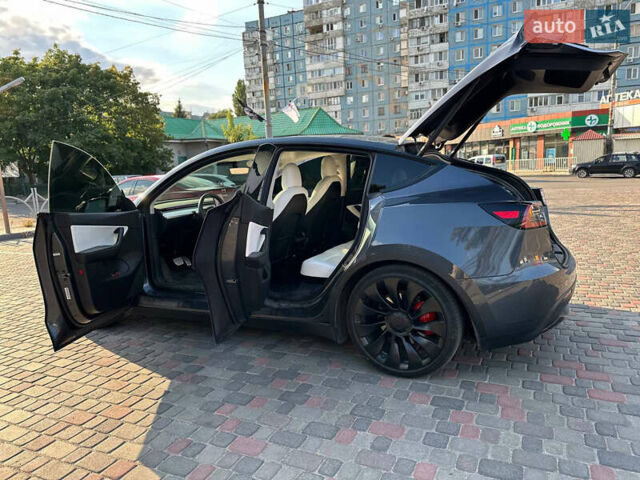 Серый Тесла Model Y, объемом двигателя 0 л и пробегом 58 тыс. км за 29999 $, фото 16 на Automoto.ua
