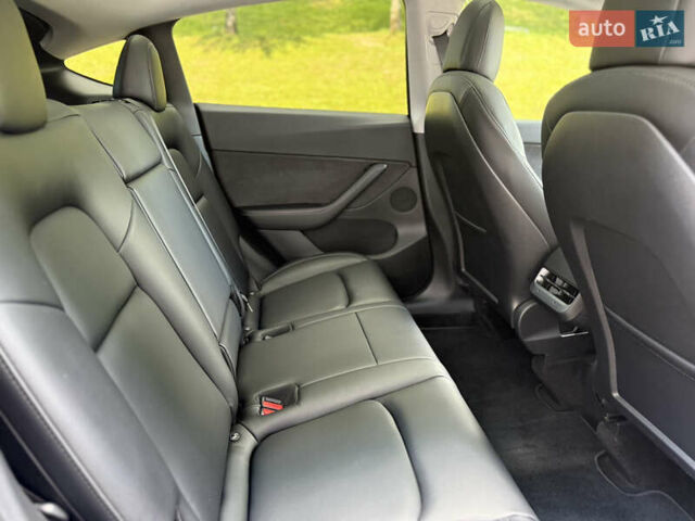 Серый Тесла Model Y, объемом двигателя 0 л и пробегом 42 тыс. км за 29900 $, фото 14 на Automoto.ua