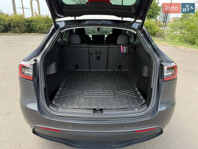 Серый Тесла Model Y, объемом двигателя 0 л и пробегом 91 тыс. км за 26500 $, фото 27 на Automoto.ua