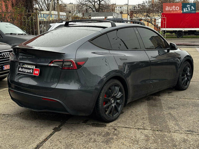 Серый Тесла Model Y, объемом двигателя 0 л и пробегом 98 тыс. км за 29490 $, фото 5 на Automoto.ua