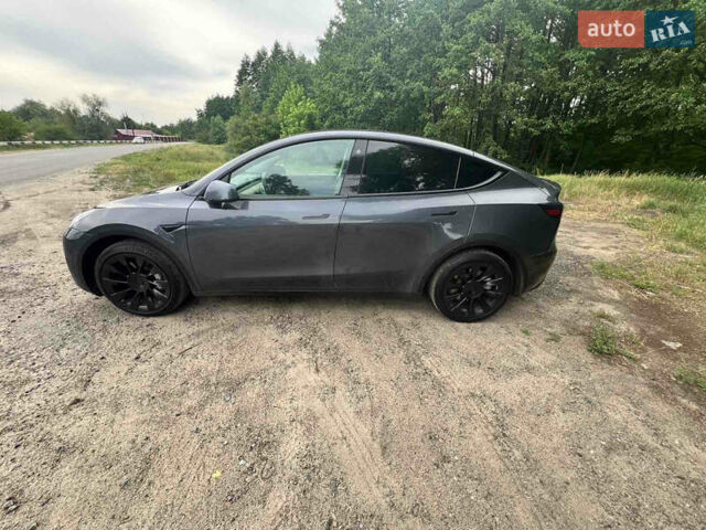 Серый Тесла Model Y, объемом двигателя 0 л и пробегом 61 тыс. км за 29000 $, фото 3 на Automoto.ua