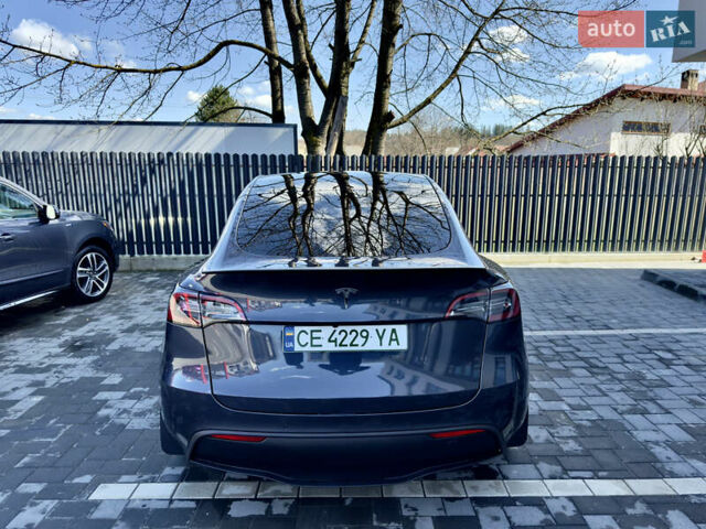 Серый Тесла Model Y, объемом двигателя 0 л и пробегом 78 тыс. км за 28000 $, фото 3 на Automoto.ua