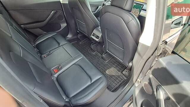 Серый Тесла Model Y, объемом двигателя 0 л и пробегом 172 тыс. км за 22699 $, фото 3 на Automoto.ua