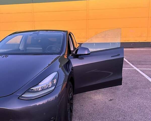 Серый Тесла Model Y, объемом двигателя 0 л и пробегом 51 тыс. км за 23500 $, фото 37 на Automoto.ua