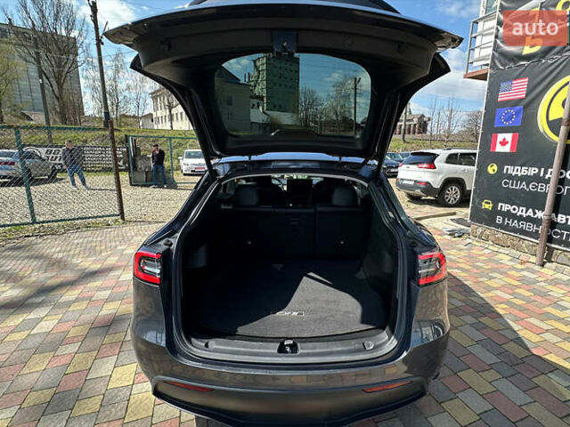 Серый Тесла Model Y, объемом двигателя 0 л и пробегом 68 тыс. км за 25500 $, фото 6 на Automoto.ua