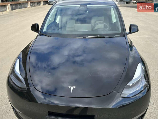 Серый Тесла Model Y, объемом двигателя 0 л и пробегом 30 тыс. км за 28000 $, фото 3 на Automoto.ua