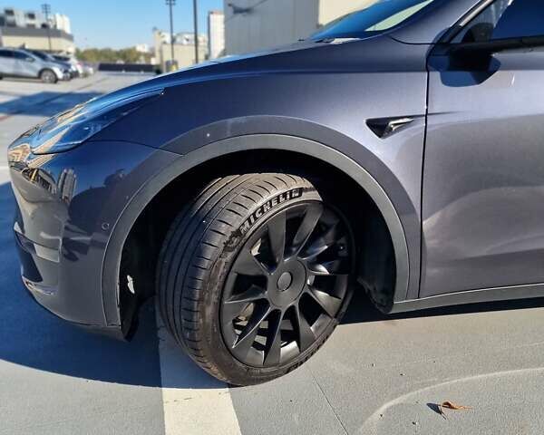 Серый Тесла Model Y, объемом двигателя 0 л и пробегом 76 тыс. км за 29700 $, фото 27 на Automoto.ua