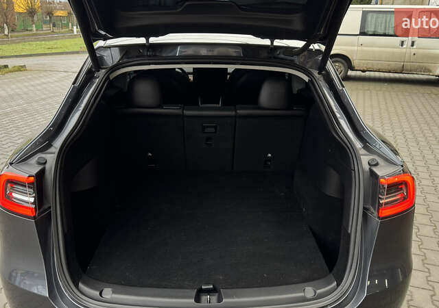 Серый Тесла Model Y, объемом двигателя 0 л и пробегом 138 тыс. км за 20200 $, фото 40 на Automoto.ua