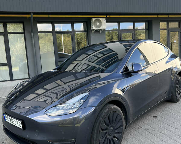 Серый Тесла Model Y, объемом двигателя 0 л и пробегом 57 тыс. км за 23300 $, фото 4 на Automoto.ua
