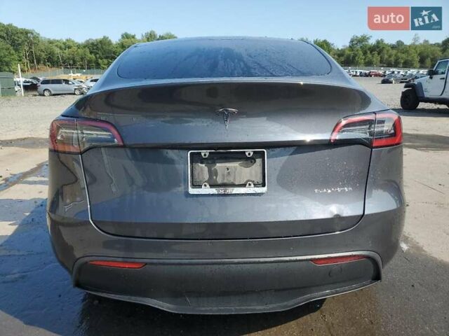 Серый Тесла Model Y, объемом двигателя 0 л и пробегом 81 тыс. км за 17500 $, фото 5 на Automoto.ua