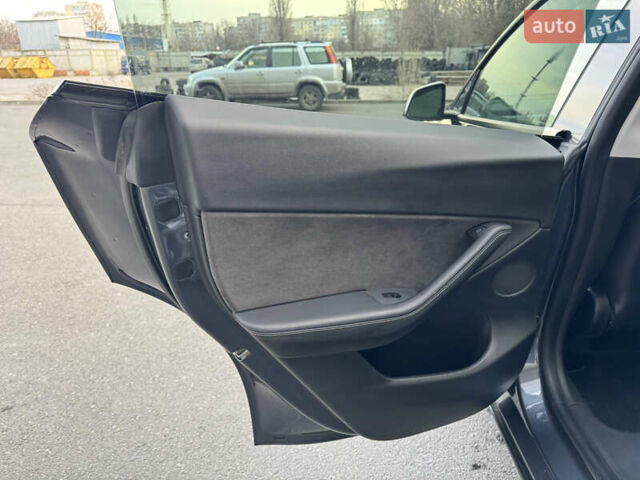 Серый Тесла Model Y, объемом двигателя 0 л и пробегом 33 тыс. км за 23999 $, фото 20 на Automoto.ua