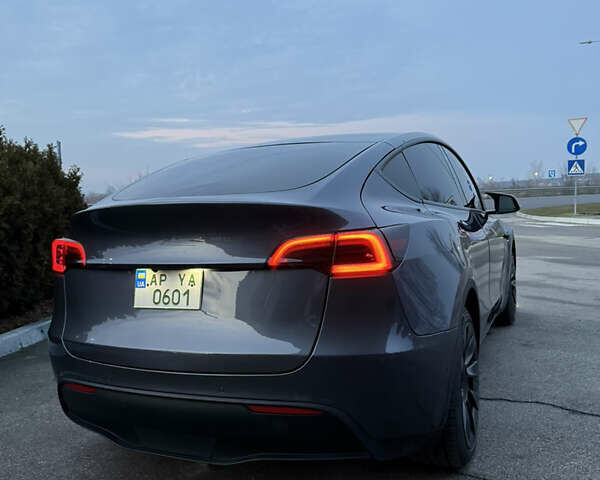 Серый Тесла Model Y, объемом двигателя 0 л и пробегом 49 тыс. км за 26500 $, фото 8 на Automoto.ua
