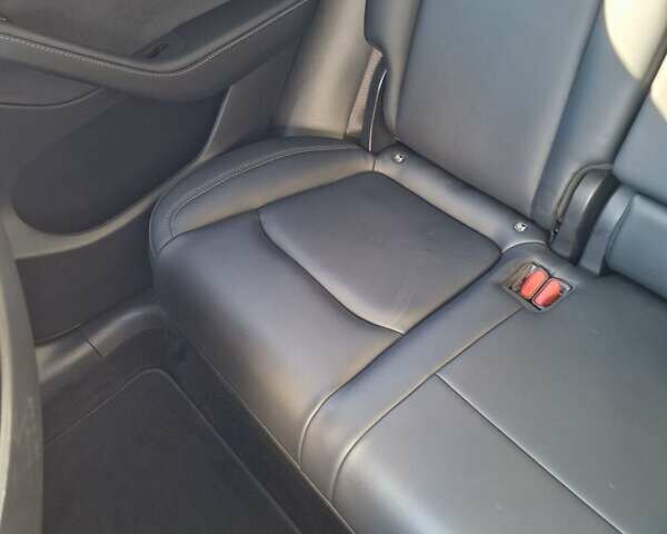 Серый Тесла Model Y, объемом двигателя 0 л и пробегом 76 тыс. км за 29700 $, фото 17 на Automoto.ua