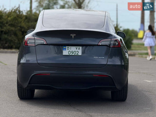 Серый Тесла Model Y, объемом двигателя 0 л и пробегом 91 тыс. км за 26500 $, фото 17 на Automoto.ua