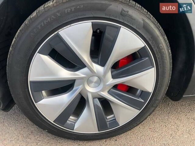 Серый Тесла Model Y, объемом двигателя 0 л и пробегом 77 тыс. км за 22700 $, фото 16 на Automoto.ua