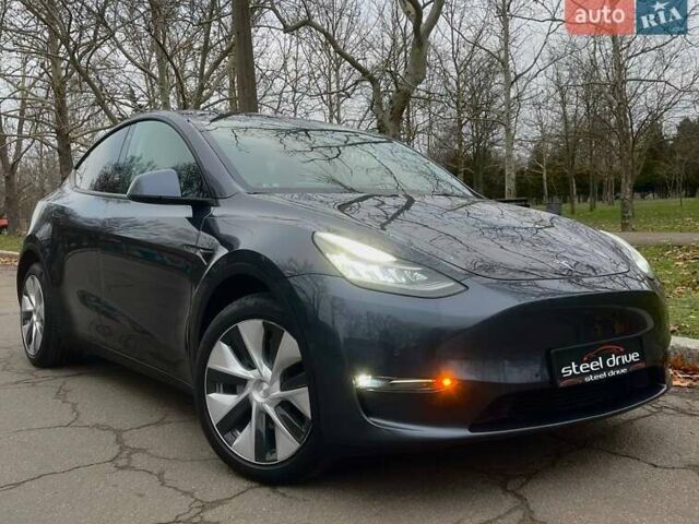 Серый Тесла Model Y, объемом двигателя 0 л и пробегом 92 тыс. км за 24499 $, фото 2 на Automoto.ua