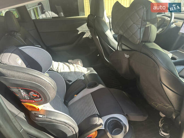 Серый Тесла Model Y, объемом двигателя 0 л и пробегом 49 тыс. км за 30700 $, фото 1 на Automoto.ua