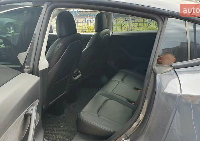 Серый Тесла Model Y, объемом двигателя 0 л и пробегом 84 тыс. км за 24999 $, фото 26 на Automoto.ua