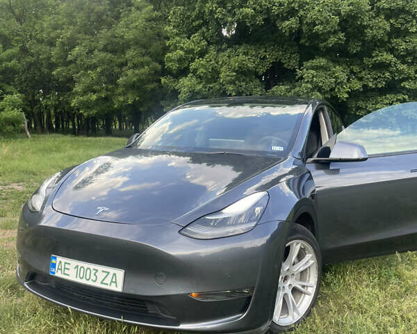 Серый Тесла Model Y, объемом двигателя 0 л и пробегом 75 тыс. км за 24500 $, фото 1 на Automoto.ua