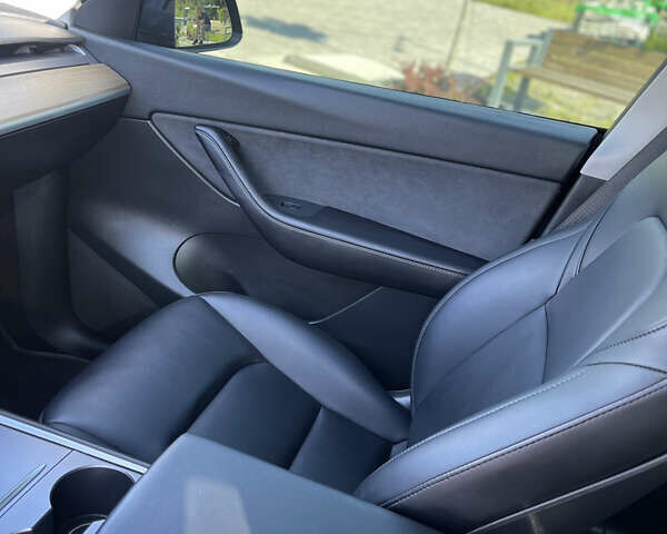 Серый Тесла Model Y, объемом двигателя 0 л и пробегом 69 тыс. км за 24100 $, фото 29 на Automoto.ua