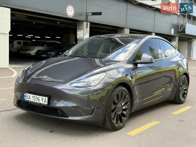 Серый Тесла Model Y, объемом двигателя 0 л и пробегом 42 тыс. км за 29900 $, фото 2 на Automoto.ua