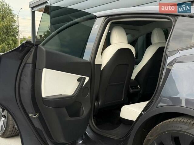 Серый Тесла Model Y, объемом двигателя 0 л и пробегом 85 тыс. км за 23900 $, фото 44 на Automoto.ua