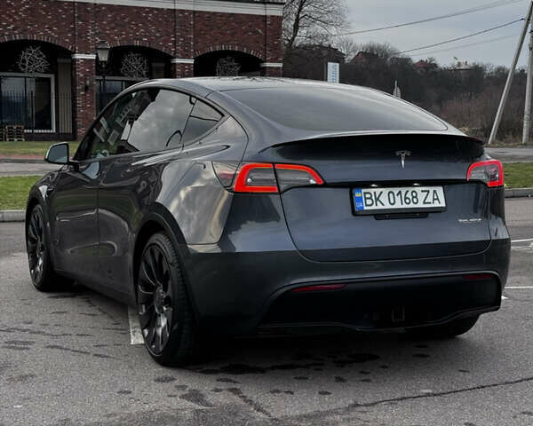 Серый Тесла Model Y, объемом двигателя 0 л и пробегом 26 тыс. км за 28900 $, фото 6 на Automoto.ua