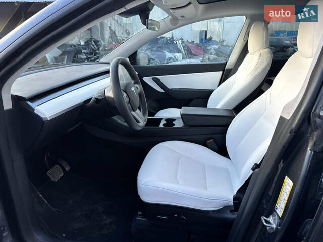 Серый Тесла Model Y, объемом двигателя 0 л и пробегом 65 тыс. км за 19300 $, фото 19 на Automoto.ua