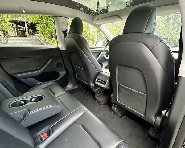 Серый Тесла Model Y, объемом двигателя 0 л и пробегом 56 тыс. км за 28500 $, фото 41 на Automoto.ua
