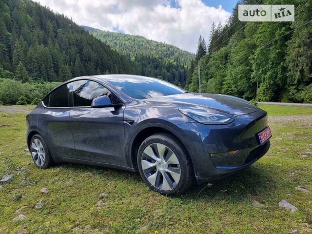 Серый Тесла Model Y, объемом двигателя 0 л и пробегом 13 тыс. км за 29999 $, фото 3 на Automoto.ua