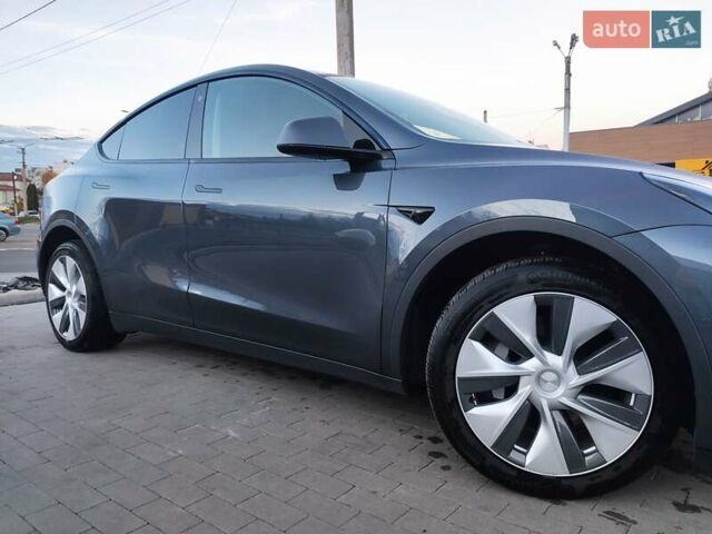 Серый Тесла Model Y, объемом двигателя 0 л и пробегом 74 тыс. км за 26999 $, фото 6 на Automoto.ua