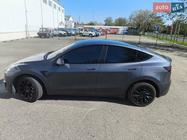 Серый Тесла Model Y, объемом двигателя 0 л и пробегом 77 тыс. км за 30999 $, фото 15 на Automoto.ua