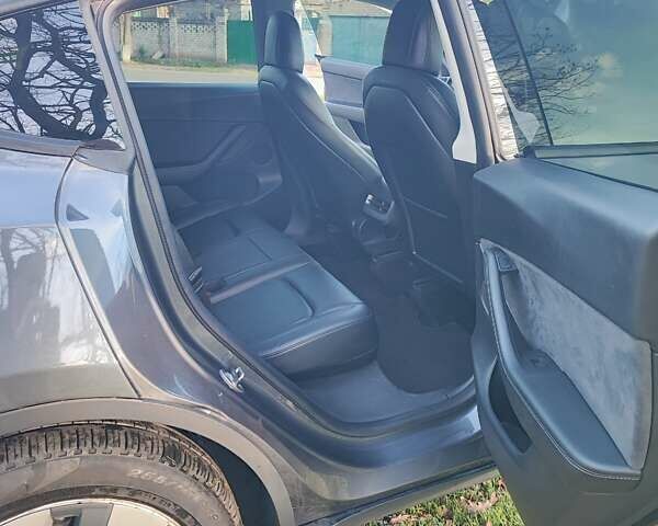Серый Тесла Model Y, объемом двигателя 0 л и пробегом 160 тыс. км за 24500 $, фото 18 на Automoto.ua