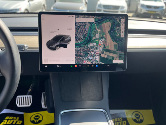 Серый Тесла Model Y, объемом двигателя 82 л и пробегом 22 тыс. км за 27000 $, фото 15 на Automoto.ua