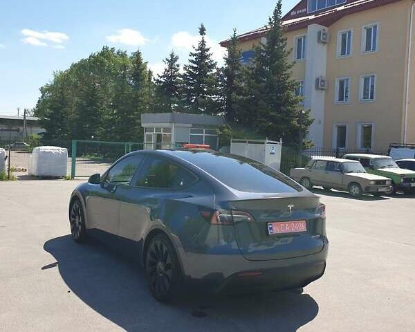 Серый Тесла Model Y, объемом двигателя 0 л и пробегом 22 тыс. км за 38500 $, фото 3 на Automoto.ua