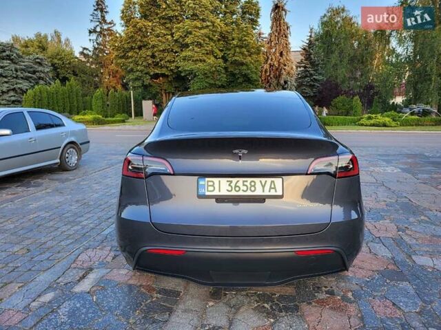 Серый Тесла Model Y, объемом двигателя 0 л и пробегом 49 тыс. км за 26950 $, фото 8 на Automoto.ua