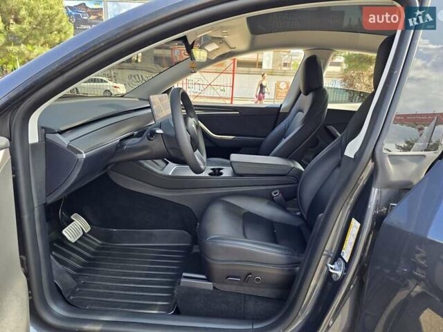 Серый Тесла Model Y, объемом двигателя 0 л и пробегом 34 тыс. км за 27500 $, фото 25 на Automoto.ua